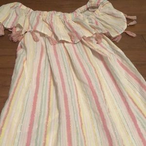 Adorable beach cover up with fringe on the top!